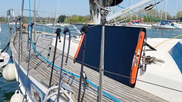 A foldable portable solar panel on a liveaboard yacht