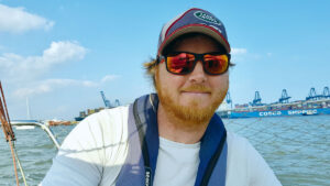 You Tube sailor Ollie Boyes smiling while on his boat
