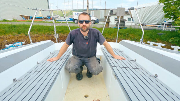 A man wearing sunglasses on the deck of an Etap 30