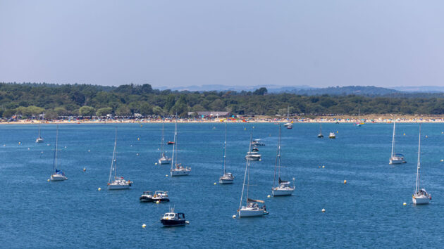 Studland bay eco moorings attract up to 87 yachts at any one time on sunny days. Credit: Brad Wakefield/The National Trust