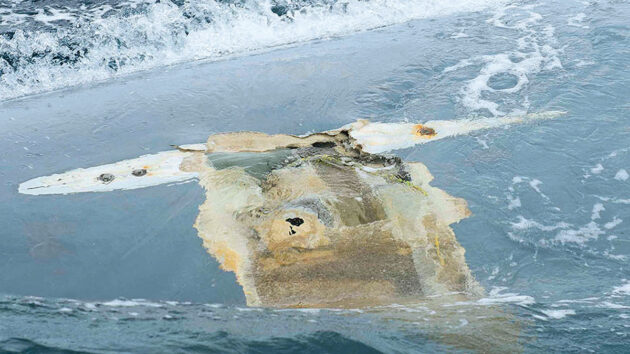 An upturned hull of a boat in the Atlantic