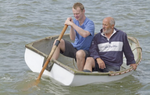 Scull a dinghy