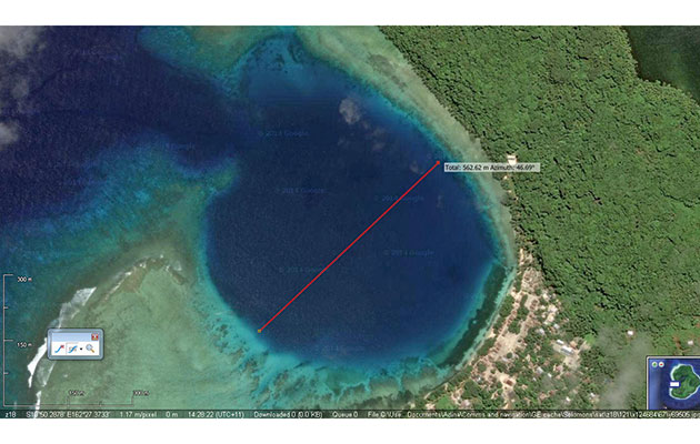 Is there enough swinging room here? We use SAS.Planet’s ruler to measure this remote anchorage on Santa Ana, Solomon Islands