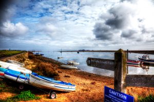 Boats pulling up on the foreshore in Wells, Norfolk
