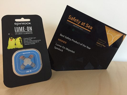 A Spinlock Lume On light alongside an award from the Safety at Sea 2017