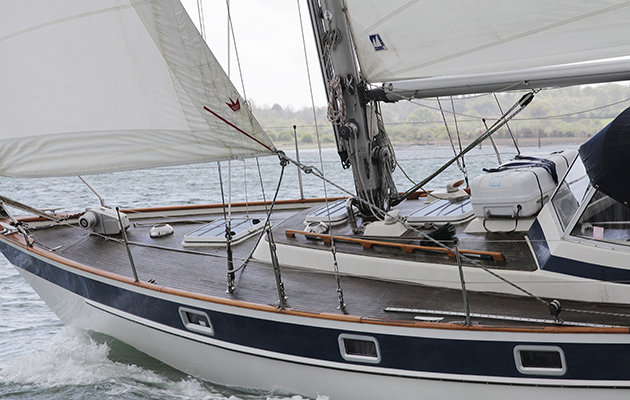 a yacht sailing windward
