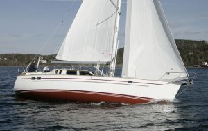 A yacht heeling with sails full of wind