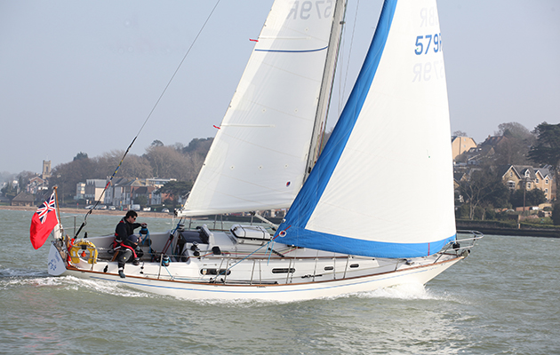 A yacht with plenty of wind in its sails