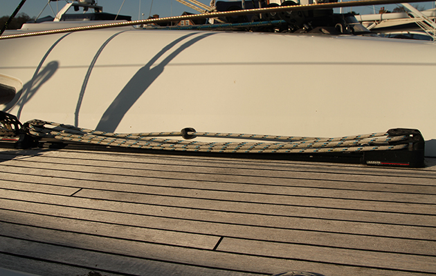 A tackle system on the deck of a yacht