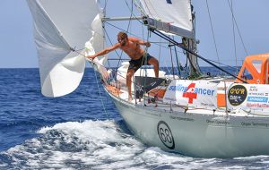 Mark SLats wearing just shorts onboard his yacht