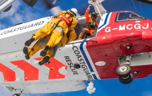 A Mayday patient being airlifted into a helicopter