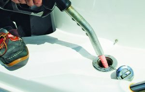 Skippers filling up a yacht with red diesel