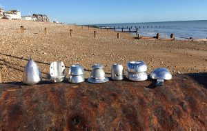 Anodes made out of sluminium lined up in a beach