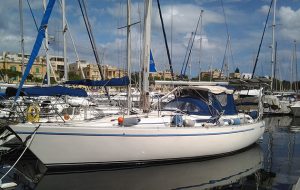 a yacht moored in a marina in Malta