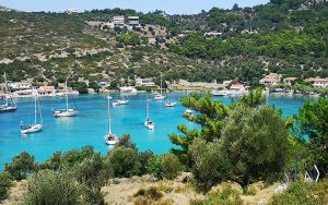 A busy anchorage at Oznor, Greece. Anchoring here requires thought about how much anchor chain you put out