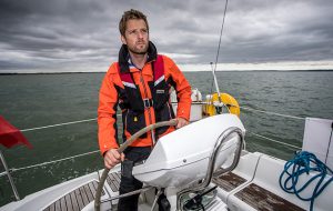 Editor of Yachting Monthly Theo Stocker helming