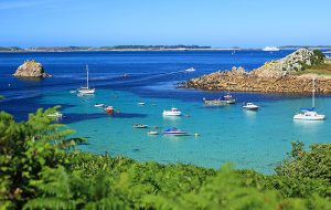 Boats anchored at Porth Conger at St Agnes, Isle of Scilly