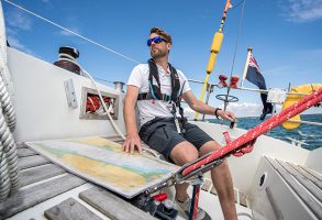 A solo sailor on a boat