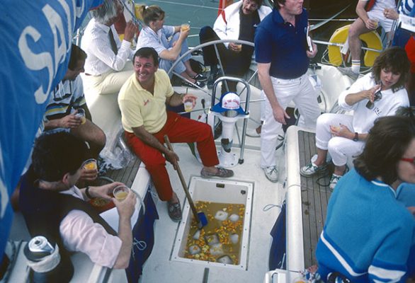 Bob Fisher hosting a cocktail on his boat during Cowes Week