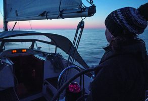 Would you know what blue and yellow flashing lights ahead were while night sailing?