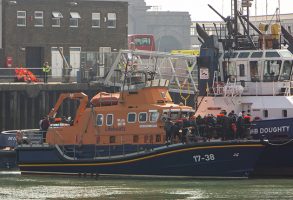 Migrants arriving into Dover docks after being rescued by the RNLI