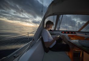 A sailor using internet at sea