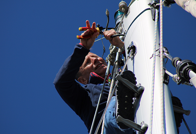 A sailor up a mast