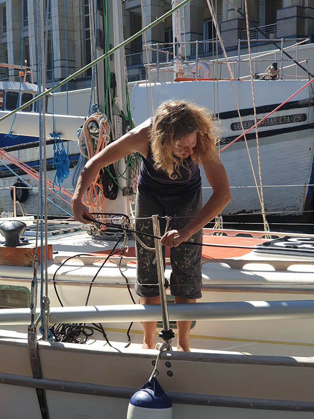 Golden Globe race 2022 skipper Kirsten Neuschafer working on her boat