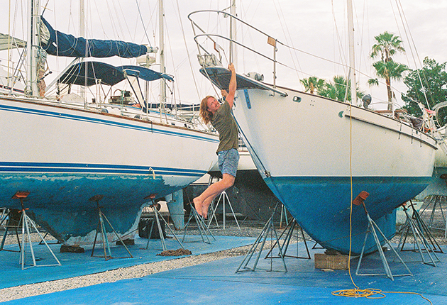 Elliott Smith hanging from the bow of his Gale Force 34