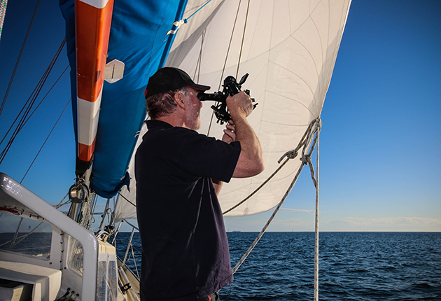 Mark Sinclair navigating by sextant