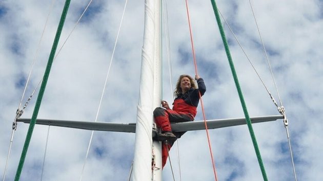 Sailor Kirsten Neuschafer up the mast of her boat