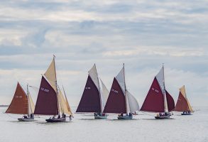 Oyster smacks sailing off the East Coast