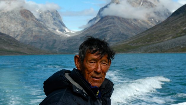 A hunter in Qinngertivaq Fjord, eastern Greenland. Respect local people and their culture when sailing in the Arctic