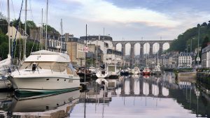 A viaduct over a river which can be seen sailing in Brittany