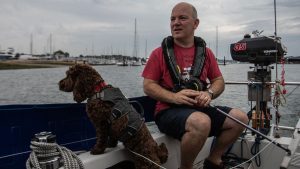 A man and his dog sailing to Ireland