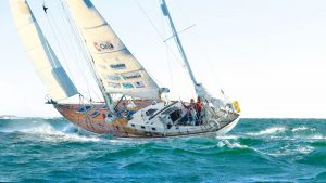 Galiana sailing with sunlight coming through her sails