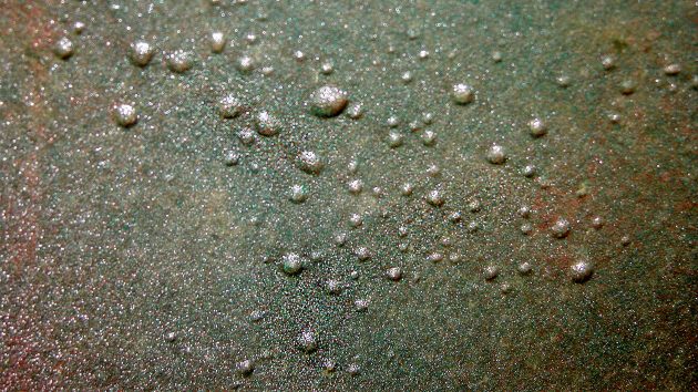 Close-up of osmosis blisters in a hull.