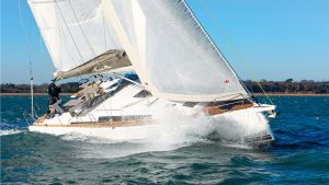 The Hanse 410 turning in slighly choppy water on a sunny day.