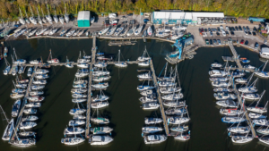 An aerial view of a marina with boats in it