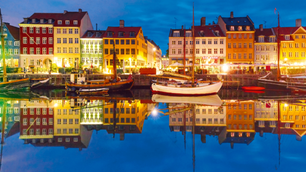 Nyhavn glows withcolour at night.
