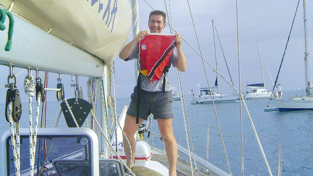 Crew James breaking out the Trinidad & Tobago courtesy flag