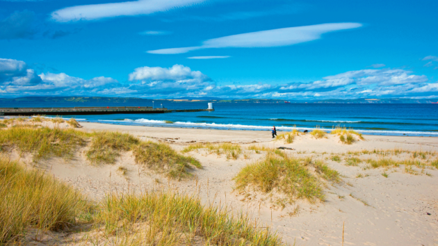 Blue skies over Nairn beach, a short walk from the harbour