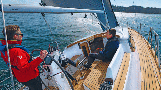The cockpit table can beremoved when sailing, leaving a substantial steel arch for bracing. 
