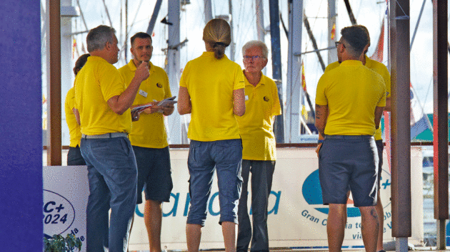 The ‘Yellow Shirts’ receive their morning briefing