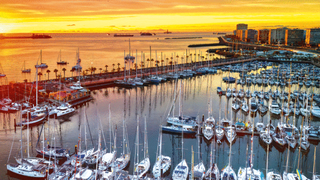 Sunrise over the ARC+ fleet in Las Palmas marina, Gran Canaria