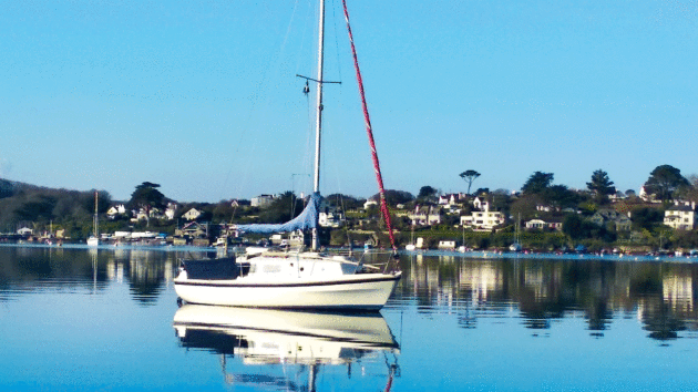 The yacht anchored in the sun