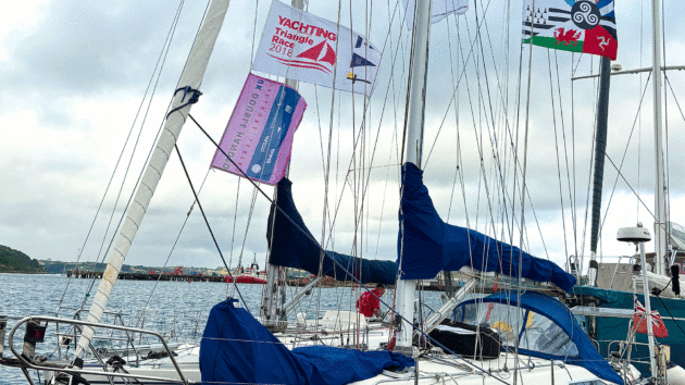 Ossian flying the YM Triangle Battle flags in Falmouth