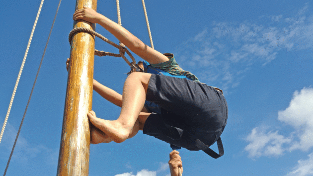 A child mast climbing.
