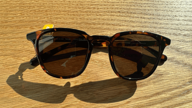 Sunglasses on wood