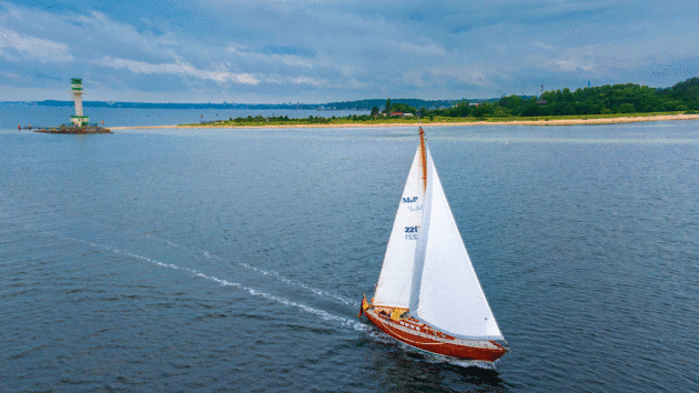 Sailing past the historicFriedrichsort lighthouse in the Kiel Fjord